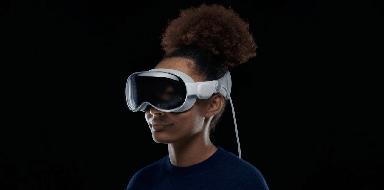 A woman wears Apple's Vision Pro headset.