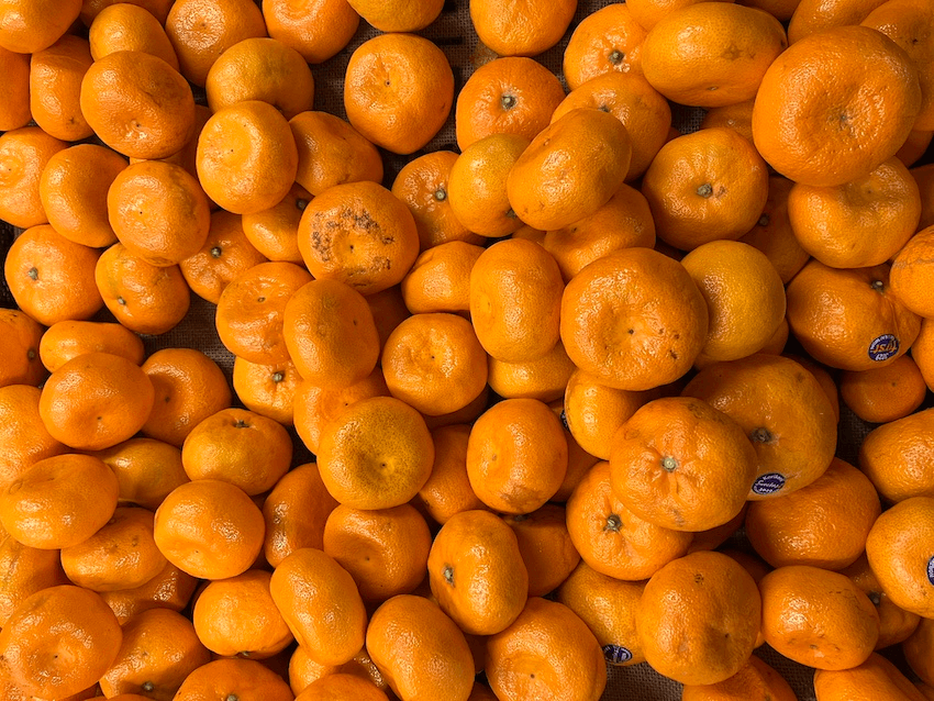 A pile of mandarins from above.