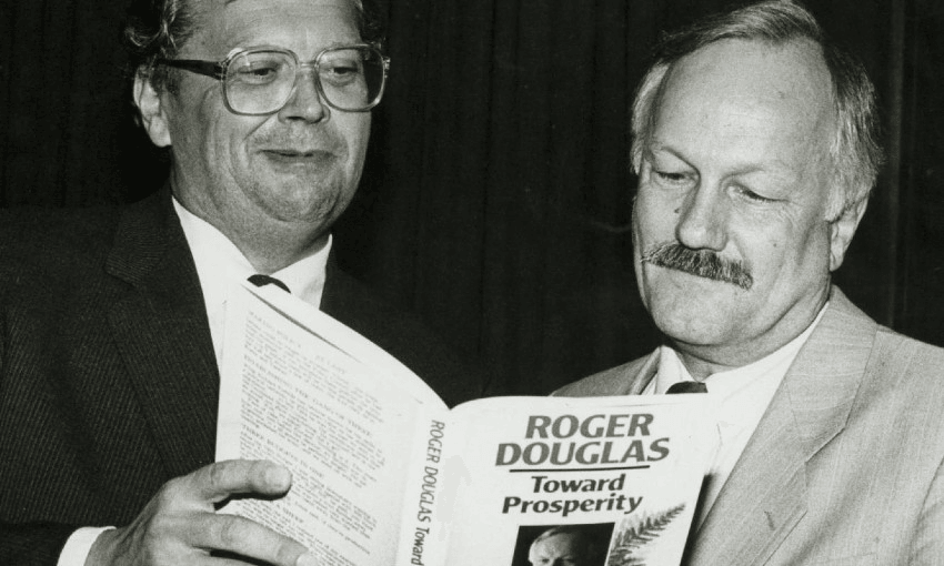 Prime minister David Lange, left, and finance minister Roger Douglas peruse a copy of Douglas’ book Towards Prosperity, 1987. (Photo: John Nicholson for Evening Post via National Library) 
