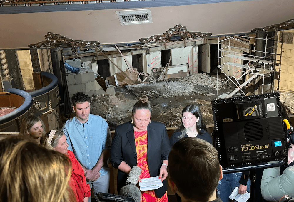 Minister Carmel Sepuloni pledges $15 million to the restoration of the St James theatre in Auckland under a mouldy air conditioning vent. (Photo: Chris Schulz) 
