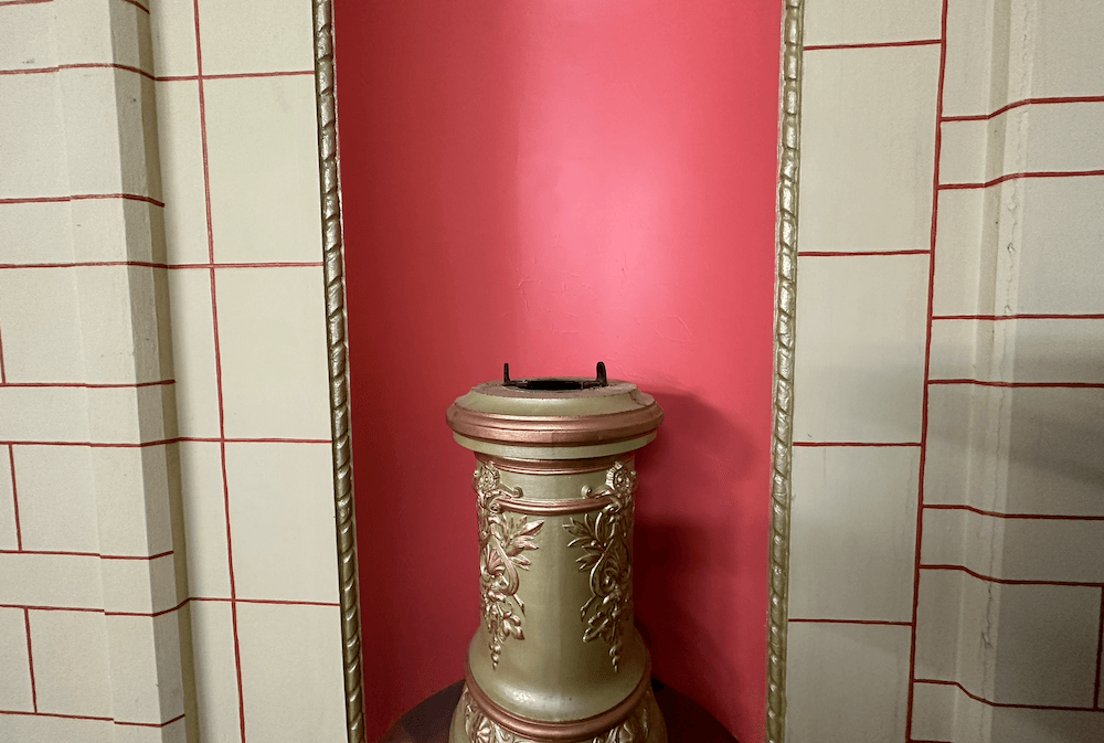 A plinth in the St James is missing its cherub.