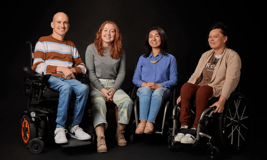 Red Nicholson (wheelchair-user), Beth Awatere, Olivia Shivas (wheelchair-user) and Tania Bissett (wheelchair-user) smile towards with camera and post against a black background. Credit: Curative