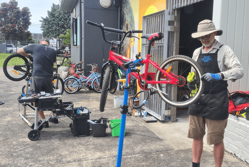 Richard Barter fixes bikes at Wesley Primary School.