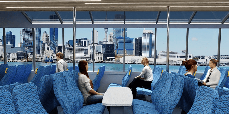 a simulated image of blue seats and cartoon people looking out the window onto the auckland shoreline of the CBD
