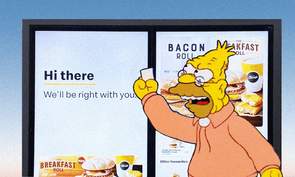 Hayden Donnell attempts to navigate the McDonald’s drive-thru (Image: Archi Banal) 
