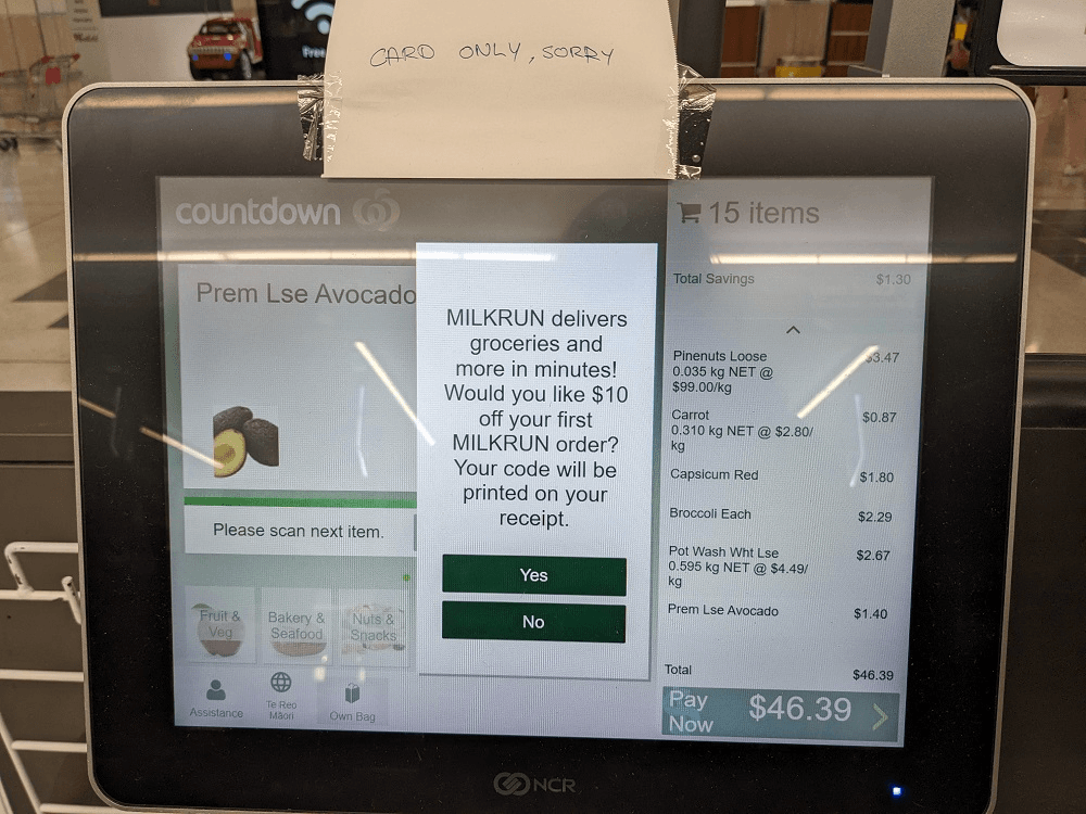 a countdown self checkout screen with a milkrun voucher