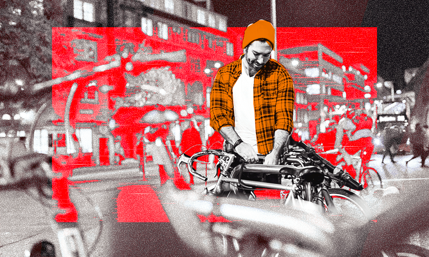 a red accent on a grey background with a man in a flannel shirt locking his bike