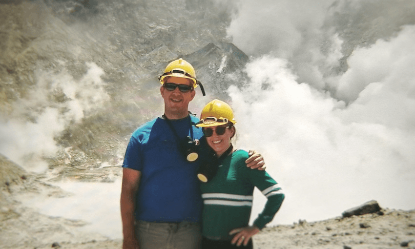 US honeymooners Matt and Lauren Urey take a snap mere minutes before the eruption  
