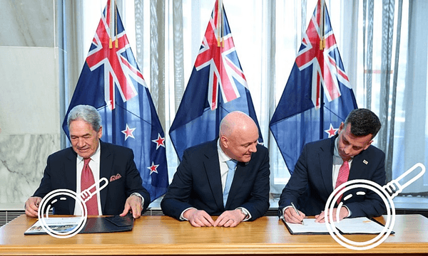 Winston Peters, Christopher Luxon and David Seymour tie the governmental knot. Photo: Hagen Hopkins/Getty 
