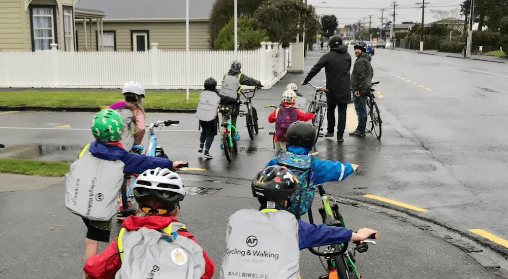 Some of the kids who bike to school in this neighbourhood are the members of Point Chevalier Primary School's bike train, picture here in their matching high-vis gear.