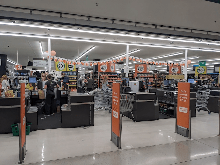 a supermarket entrances with everyday rewards bunting