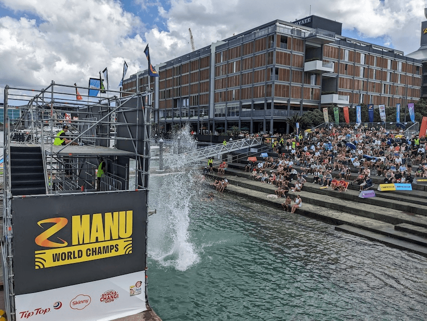 someone landing in the water with a big splash surrounded by Z fossil fuel branding as they try to rehabilitate their polluting image with the public