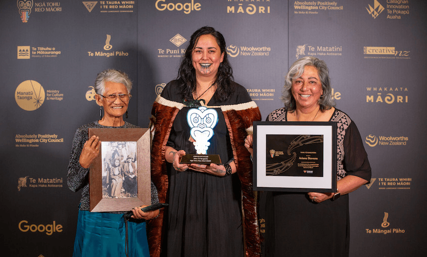 Ariana Stevens and two members of her whānau smile for the camera at the Ngā Tohu Reo Māori awards.