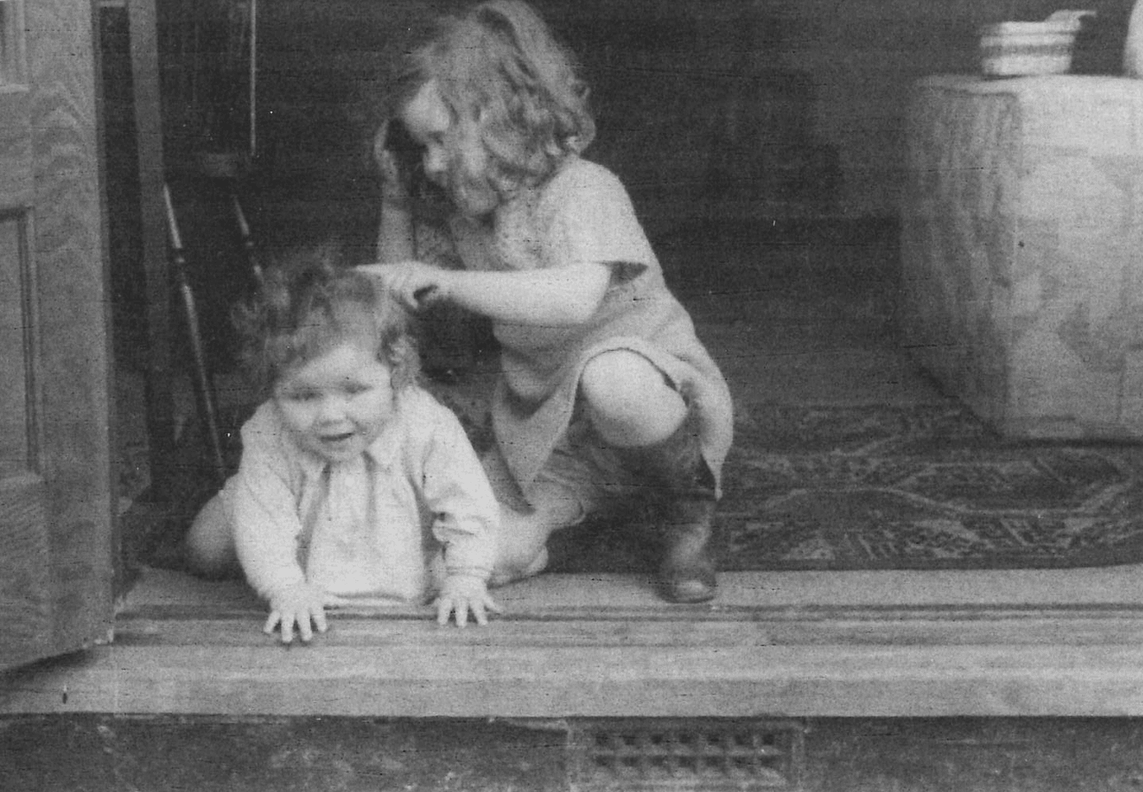 Diana Wynne Jones as a child, brushing the hair of her younger sister Isobel