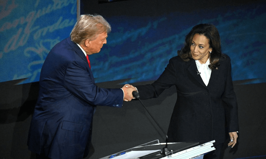 Kamala Harris shakes hands with Donald Trump at the start of the presidential debate in Philadelphia, September 10, 2024. (Photo: SAUL LOEB/AFP via Getty Images) 
