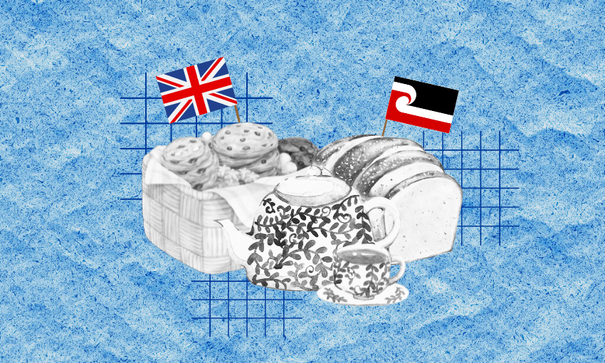 A basket of biscuits with a British flag, tea pot, tea cup, and a loaf of bread with a Māori flag on it.