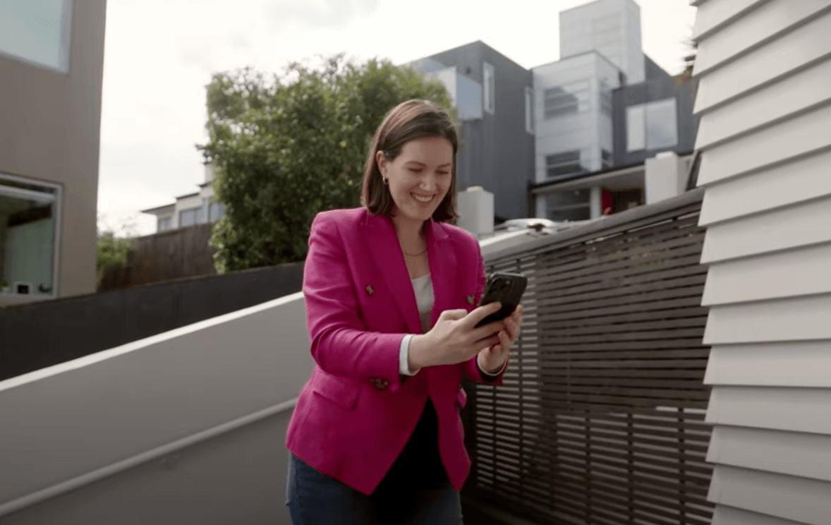 Brooke van Velden looking absolutely stoked to finish her stint at a delivery driver, 15 September 2024. (Image: Still from Act promotional video).