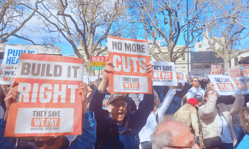 “They save, we pay”: the scene in Dunedin’s Octagon on Saturday (Photo: Tara Ward) 
