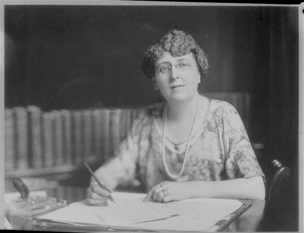 Lucy Maud Montgomery at her desk 