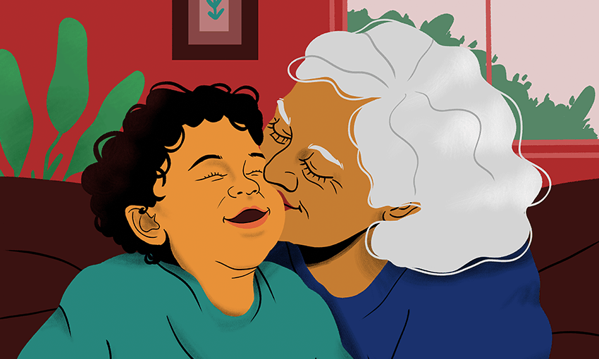 An elderly woman with white hair lovingly kisses a smiling child on the cheek. They are indoors, with a red wall and plant in the background. The warmth and affection between them are evident.