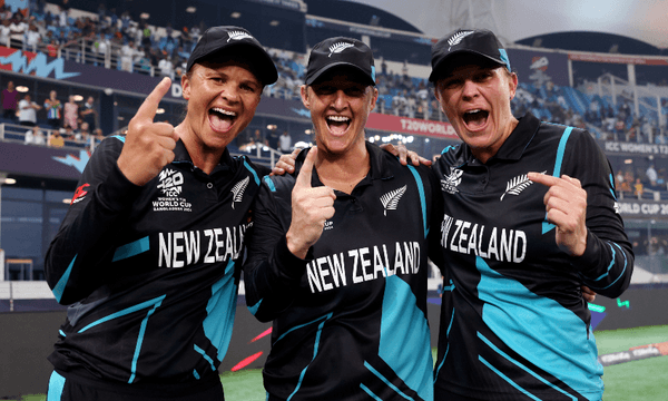 Suzie Bates, Sophie Devine and Lea Tahuhu celebrate victory after defeating South Africa in the Women’s T20 World Cup Final at Dubai International Stadium. (Photo by Matthew Lewis-ICC/ICC via Getty Images) 
