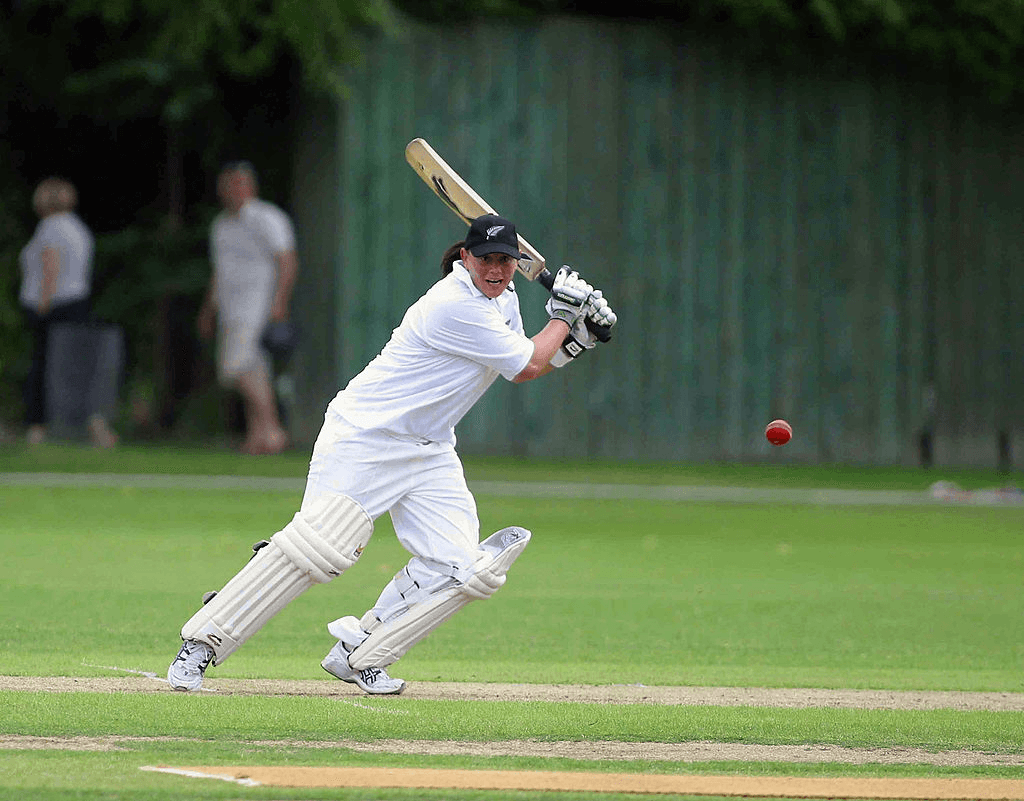 Maia Lewis hits the ball through cover point while in action for New Zealand in 2004.