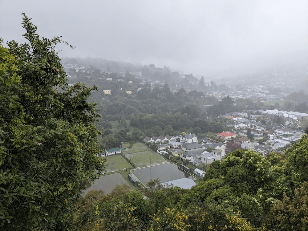 flooded tennis courts as seen from above on a very rainy day