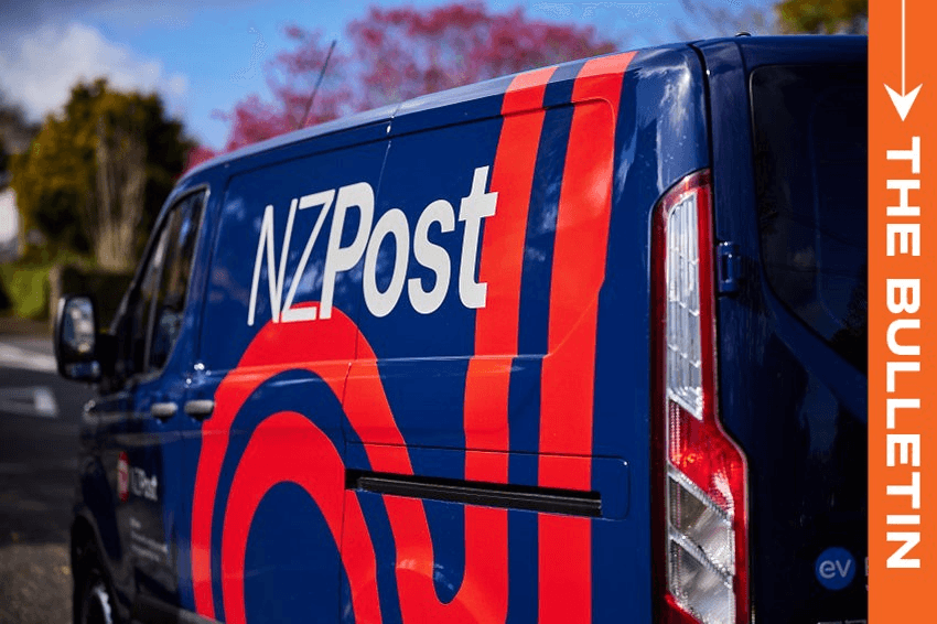 A NZ Post van with a blue and red design is parked on a street. The words "NZ Post" are prominently displayed on the side. The van is part of an image with an orange vertical banner that reads "The Bulletin." Trees and houses are in the background.