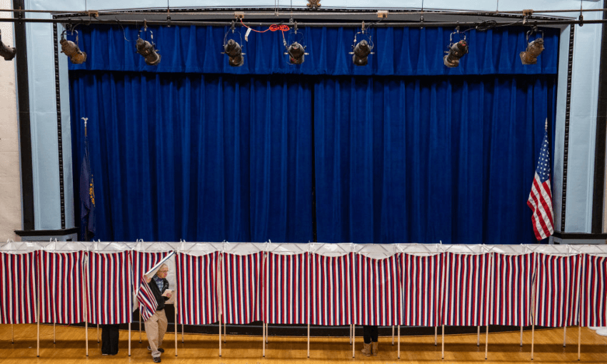 A voter emerges from a booth in Lancaster, New Hampshire pn US election day, 2024. (Photo by Joseph Prezioso / AFP via Getty Images) 
