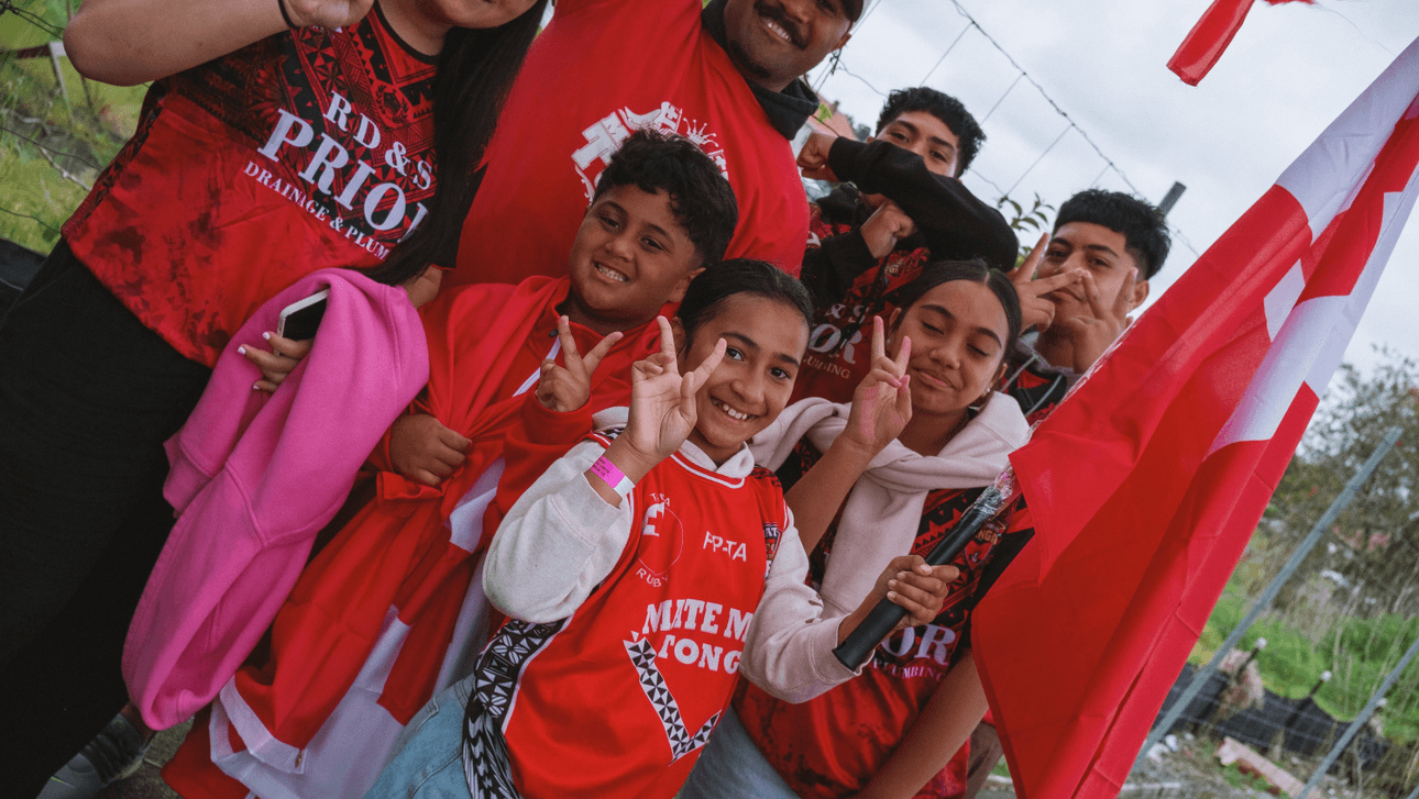 Group of Tongan rugby league supporters in red