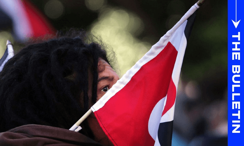 A protester outside parliament in May (Photo by DAVE LINTOTT/AFP via Getty Images) 
