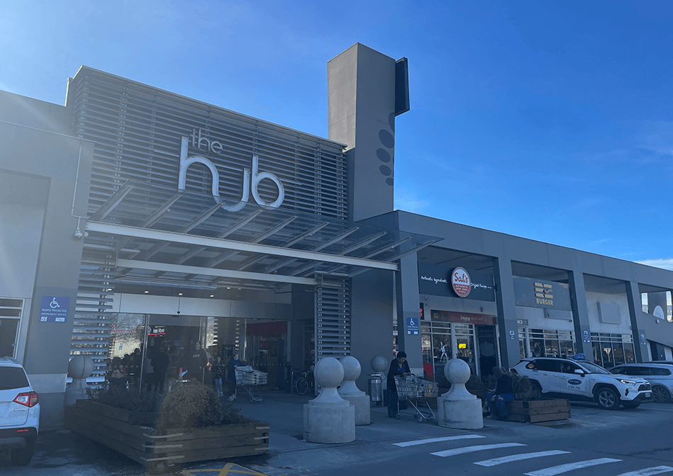 Photo of the outside of a mall with the sign saying 'The Hub'