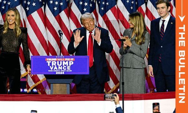 Donald Trump gestures after speaking at the West Palm Beach Convention on November 6 (Photo by JIM WATSON/AFP via Getty Images) 
