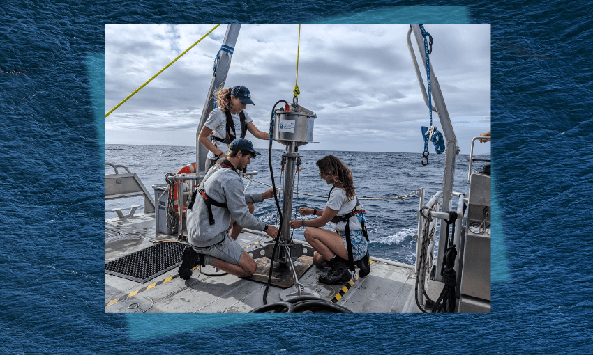 Mara Fischer, Ben Harris and Tara Williams prepare a sediment corer for its journey to the bottom of the sea (Image: Shanti Mathias) 
