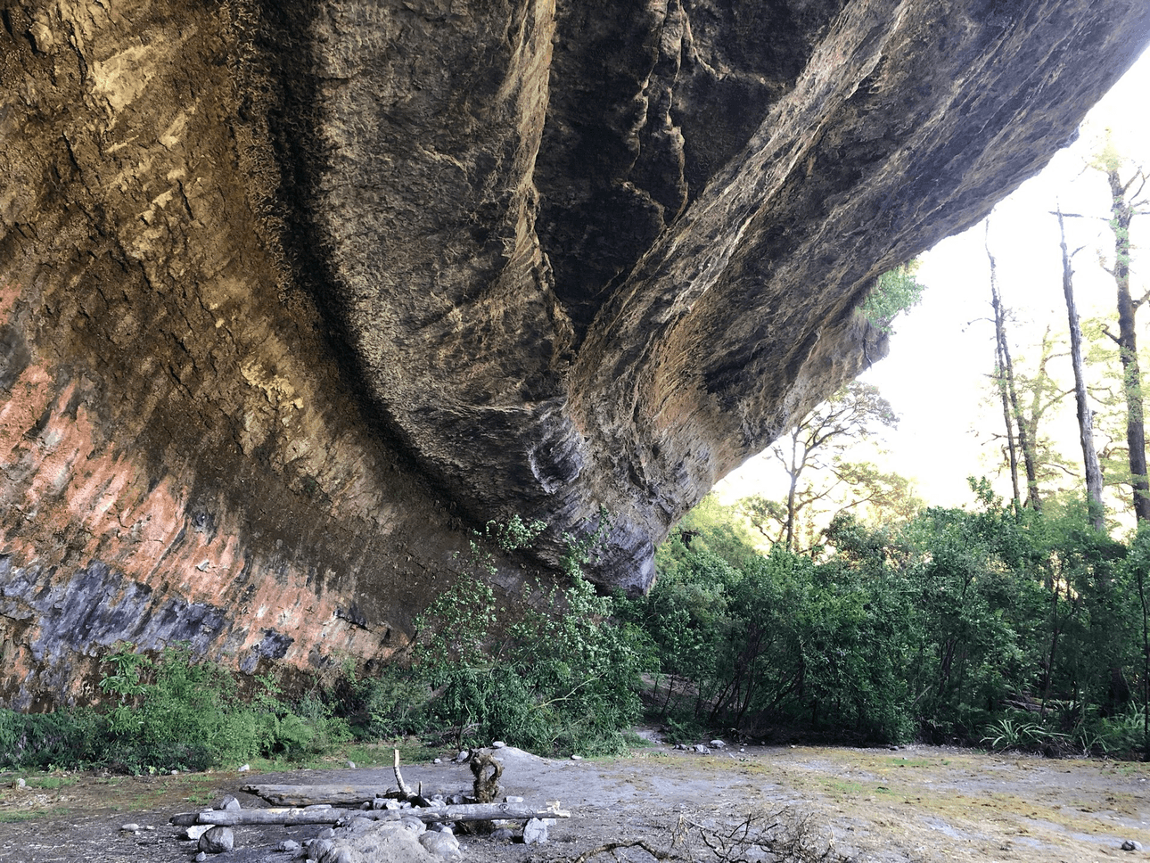 A large, curved limestone overhang