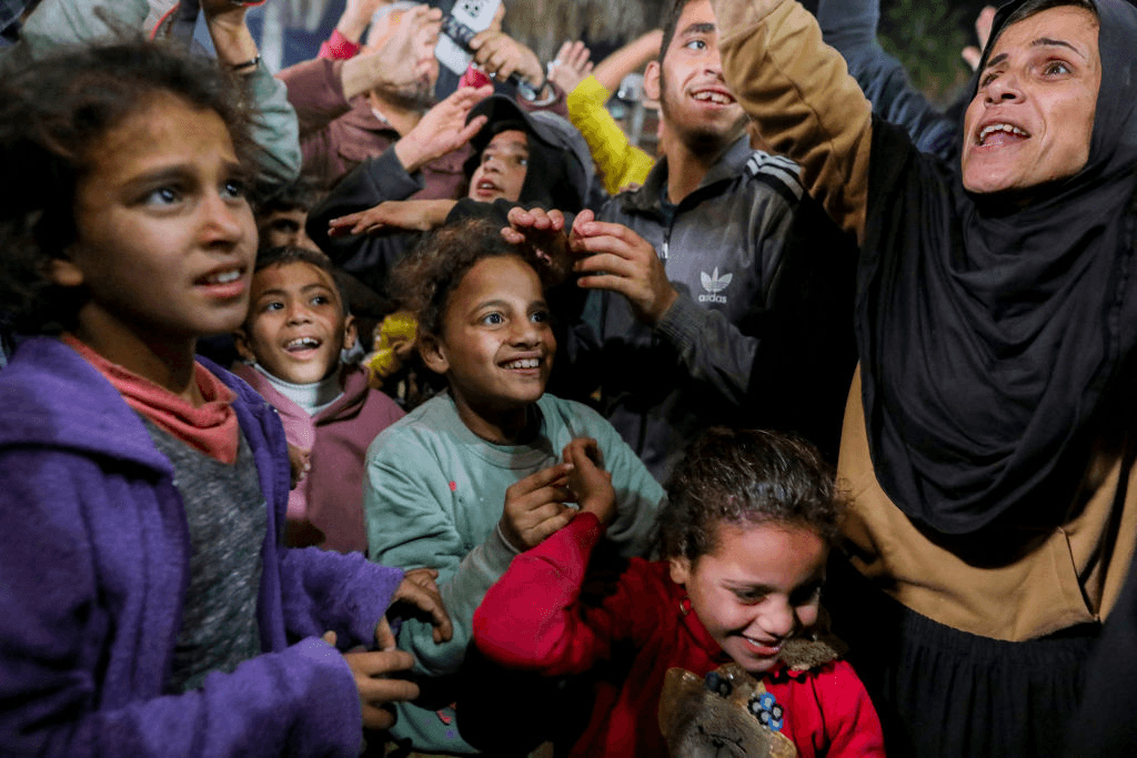 Gazans celebrate as news spread that a ceasefire and hostage release deal had been reached between Israel and Hamas (Photo: Youssef Alzanoun / Middle East Images via AFP/Getty)  
