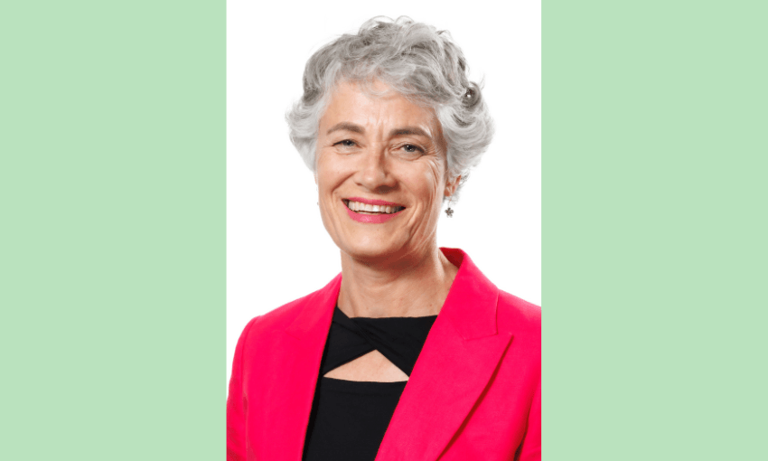 a green background with a photo of Nic Quilty, an older pakeha woman with a pink blazer, black top, curly grey hair and a big smile 