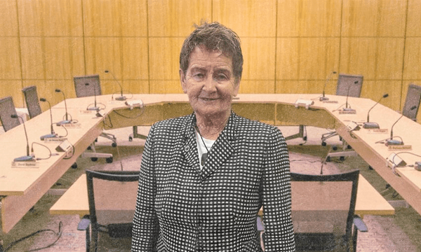 Former finance minister Ruth Richardson superimposed onto an image of the select committee room.