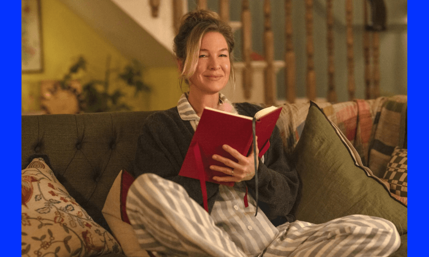 A photograph of Bridget Jones on the couch with her diary.