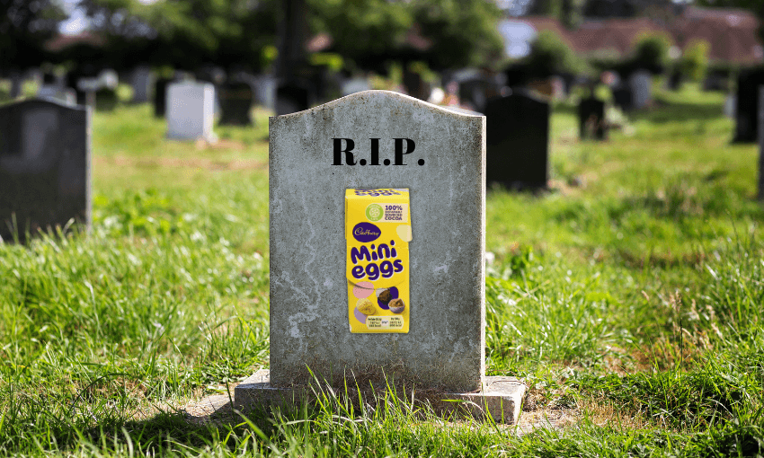 A headstone in a cemetery with "RIP" written on it an and image of the Cadbury mini eggs carton