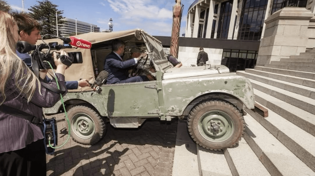 David seymour driving a land rover up parliament's steps