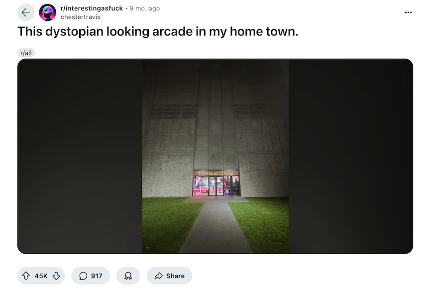 A Reddit post with 45,000 likes of the Timezone at night with the caption "this dystopian looking arcade in my home town"