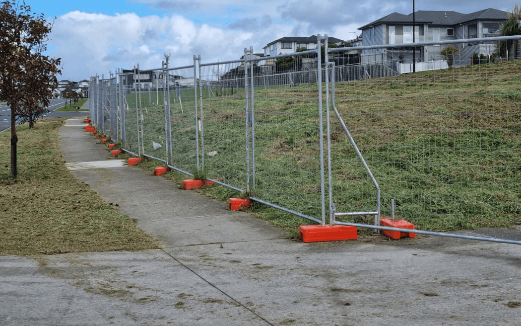 land with temporary fencing up around it
