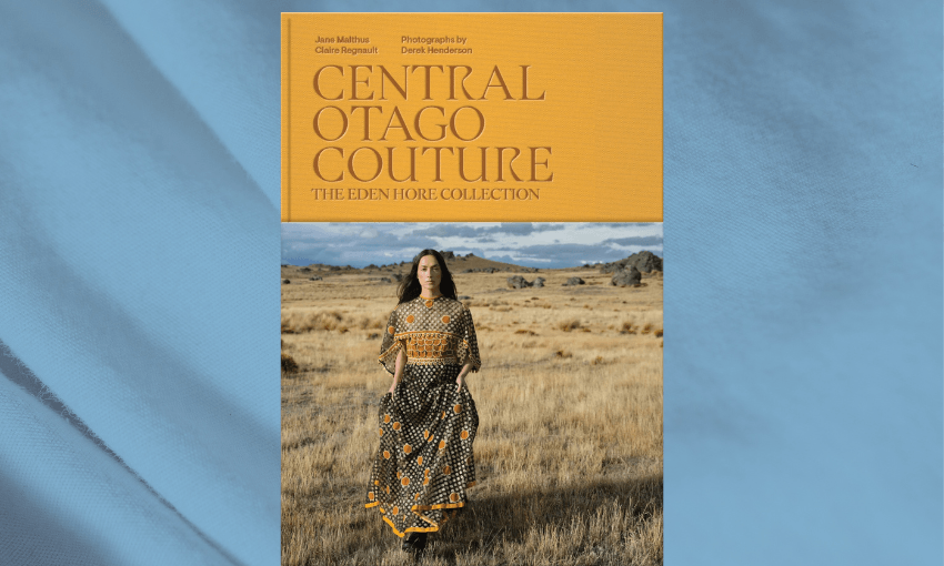 The cover of Central Otago Couture which features a model wearing a couture dress in the Otago high country.