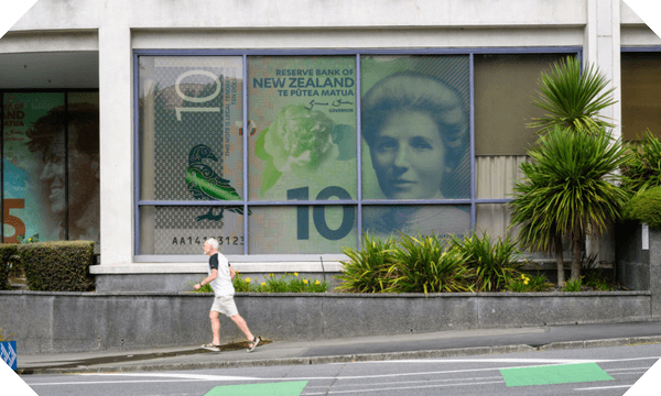 Edmund Hillary and Kate Sheppard gaze out the Reserve Bank building windows. Photographer: Mark Coote/Bloomberg via Getty Images 
