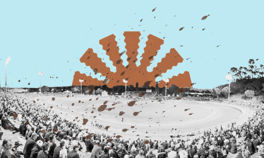 A black and white photo of a crowded stadium with people watching a sports event. The sky is bright blue with a large, abstract, brown-orange sunburst design overlaying the scene. Trees and floodlights are visible in the background.