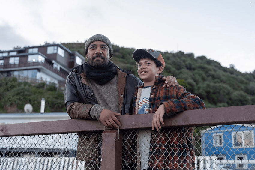 Dominic Ona-Ariki wears a beanie and heavy knit on the Wellington coast