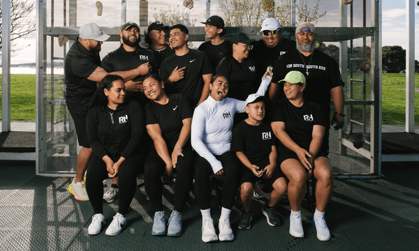 A big groups of people in sportswear caught in a silly moment