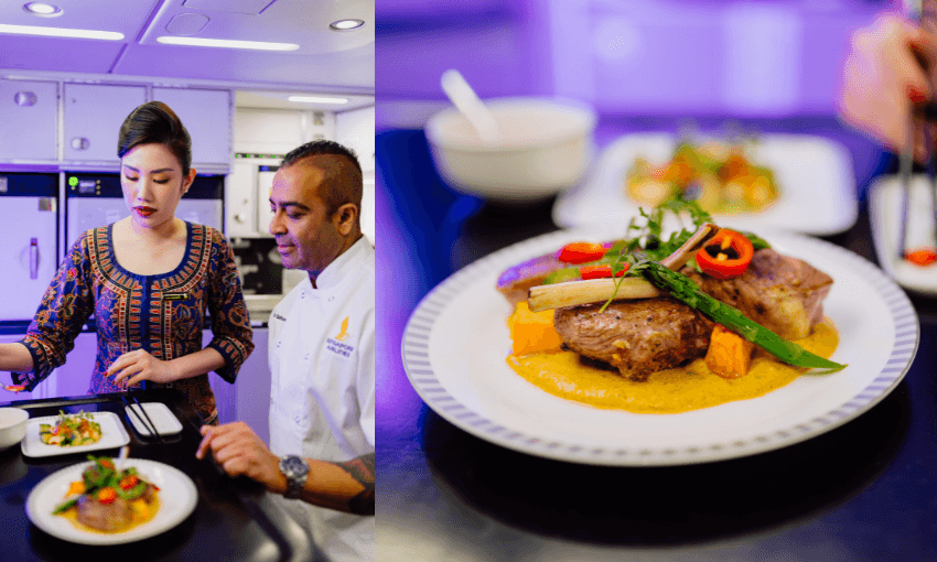 A woman and a chef prepare a dish in an airplane galley kitchen. On the right, a close-up of the plated dish shows a gourmet entrée with meat, vegetables, and garnish on a white plate with delicate decoration.