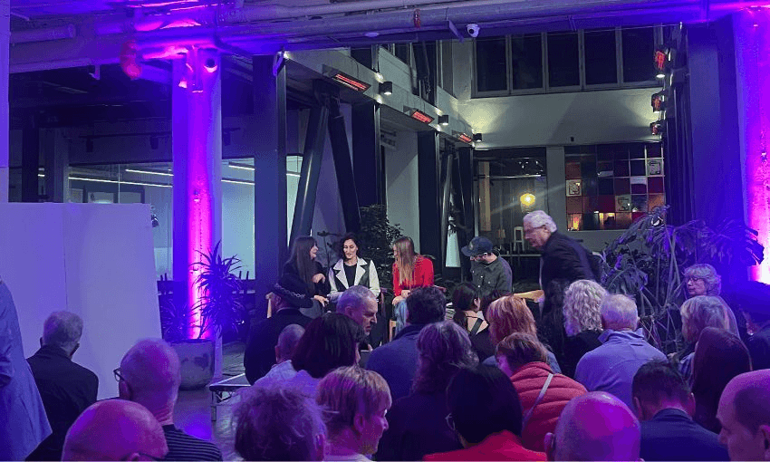 A small crowd listens to Vision for Wellington panellists inside The Exchange.